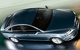 Audi A6. Modelo 2009. Imagen. Berlina. Lateral Cenital. Movimiento. Azul estrato efecto perla.
