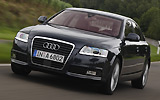 Audi A6. Modelo 2009. Imagen. Berlina. Frontal lateral. Coche en movimiento. Carretera.