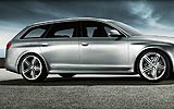 Audi RS6 Avant. Modelo 2009. Imagen. Familiar. Lateral. Estudio. Color Plata Monza Metalizado. Llanta de cinco radios segmentados.