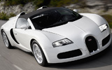 Bugatti Veyron 16.4 Grand Sport. Gama 2009. Imagen. Carrocer�a descapotable. Frontal lateral cenital. Movimiento. Carretera.