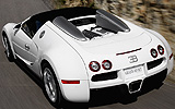 Bugatti Veyron 16.4 Grand Sport. Gama 2009. Imagen. Carrocer�a descapotable. Posterior lateral cenital. Movimiento. Carretera. Techo lona.