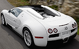 Bugatti Veyron 16.4 Grand Sport. Gama 2009. Imagen. Carrocer�a descapotable. Posterior lateral cenital. Movimiento. Carretera. Techo r�gido.