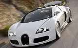 Bugatti Veyron 16.4 Grand Sport. Gama 2009. Imagen. Carrocer�a descapotable. Frontal lateral cenital. Movimiento. Carretera.