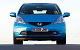 Honda Jazz. Modelo 2009. Imagen. Frontal. Coche parado. Carretera. Azul.