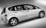 Honda Jazz. Modelo 2009. Imagen. Lateral. Coche parado. Estudio. Gris.