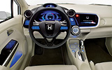 Honda Insight Concept. Prototipo 2008. Imagen. Interior. Salpicadero. Volante. Cuadro de mandos. Palanca de cambios. Coche parado. Estudio.