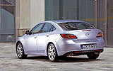 Mazda6. Modelo 2008. 5 puertas. Imagen. Lateral- posterior. Coche parado. Color Galaxy Gray.