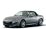 Mazda MX-5. Modelo 2009. Imagen. Frontal- lateral. Coche parado. Techo de lona. Estudio. Gris