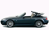 Mazda MX-5. Roadster Coup�. Modelo 2009. Imagen. Lateral. Coche parado. Techo met�lico plegable. Estudio. Gris oscuro.