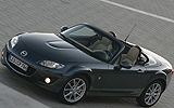 Mazda MX-5. Roadster Coup&eacute;. Modelo 2009. Imagen exterior. Frontal lateral. Carretera. Gris.