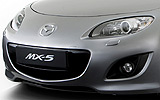 Mazda MX-5. Modelo 2009. Imagen. Detalle frontal. Coche parado. Estudio. Gris