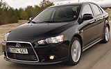 Mitsubishi Lancer Sportback. Modelo 2009. Imagen exterior. Frontal. Movimiento. Carretera. Negro