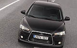 Mitsubishi Lancer Sportback. Modelo 2009. Imagen exterior. Frontal. Movimiento. Carretera. Negro