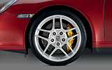 Porsche 911 Targa. Modelo 2009. Imagen. Detalle llanta Carrera S ll 19 pulgadas. Rojo rub� metalizado.