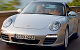 Porsche 911 Targa. Modelo 2009. Imagen. Exterior. Frontal. Coche en movimiento. Carretera. Gris.