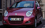 Suzuki Alto. Modelo 2009. Imagen. Exterior. Frontal. Coche parado. Carretera.