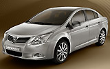 Toyota Avensis. Modelo 2009. Imagen. Exterior. Frontal- lateral. Coche parado. Estudio. Gris.